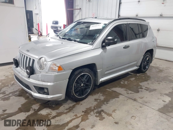 2008 Jeep Compass Sport with VIN 1J8FF47W88D651805, listed as a IAAI auction lot 40960467 with 205,414 mi miles and . Bid and sale history available at carsss.com. Image 2.