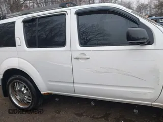 2005 Nissan Pathfinder SE with VIN 5N1AR18U15C734896, listed as a IAAI auction lot 41038342 with 188,910 mi miles. Bid and sale history available at carsss.com. Image 13.