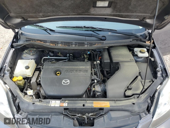 2010 Mazda 5 Sport z VIN JM1CR2W34A0386374, wystawiony jako Copart lot #54013095 z przebiegiem 76 871 mil mil oraz Szkoda całkowita • Salvage title. Historia ofert i sprzedaży dostępna na DreamBid. Obrazek 12.