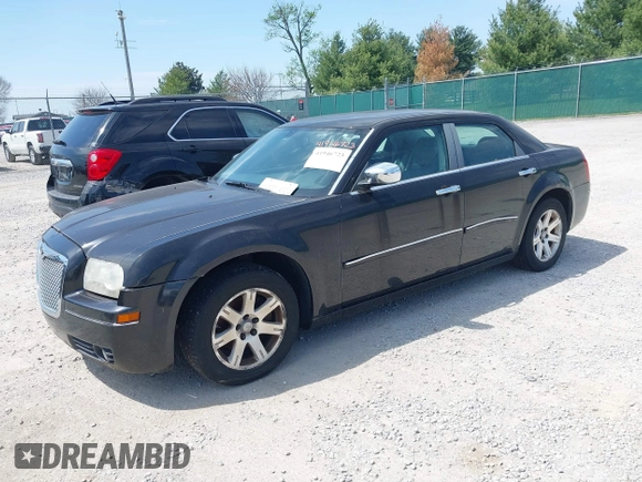 2006 Chrysler 300 Touring with VIN 2C3LA53G66H329729, listed as a IAAI auction lot 41946723 with 134,465 mi miles. Bid and sale history available at carsss.com. Image 2.