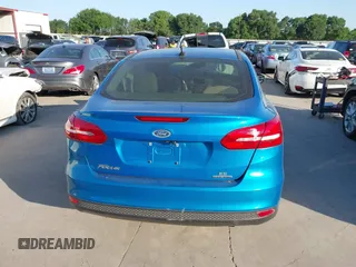 2016 Ford Focus SE with VIN 1FADP3F2XGL387131, listed as a IAAI auction lot 41992802 with 112,274 mi miles and . Bid and sale history available at DreamBid. Image 16.