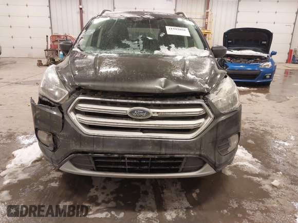 2018 Ford Escape SE with VIN 1FMCU9GD8JUA53114, listed as a IAAI auction lot 41592808 with 167,659 mi miles. Bid and sale history available at carsss.com. Image 6.