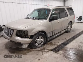 2004 Ford Expedition Special Service with VIN 1FMPU16L34LB27156, listed as a IAAI auction lot 41561202 with 230,318 mi miles. Bid and sale history available at carsss.com. Image 2.