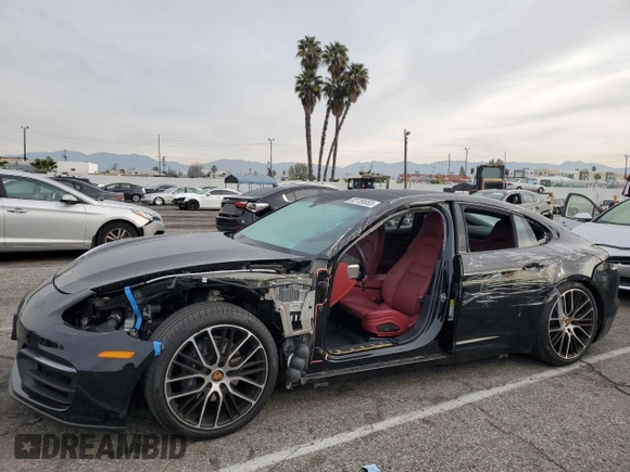 2022 Porsche Panamera z VIN WP0AJ2A79NL102055, wystawiony jako Copart lot #82739553 z przebiegiem 12 943 mil mil oraz . Historia ofert i sprzedaży dostępna na DreamBid. Obrazek 1.
