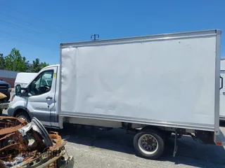2019 Ford Transit with VIN 1FDBF8ZM7KKA38548, listed as a IAAI auction lot 42251683 with 115,163 mi miles and . Bid and sale history available at DreamBid. Image 14.