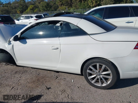 2012 Volkswagen Eos Komfort with VIN WVWBW7AH9CV017620, listed as a IAAI auction lot 40945479 with 96,444 mi miles and . Bid and sale history available at DreamBid. Image 14.
