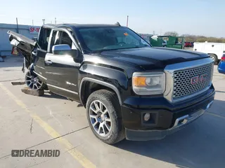 2015 GMC Sierra 1500 Denali with VIN 3GTU2WEC7FG204610, listed as a IAAI auction lot 41730939 with 130,620 mi miles. Bid and sale history available at carsss.com. Image 1.
