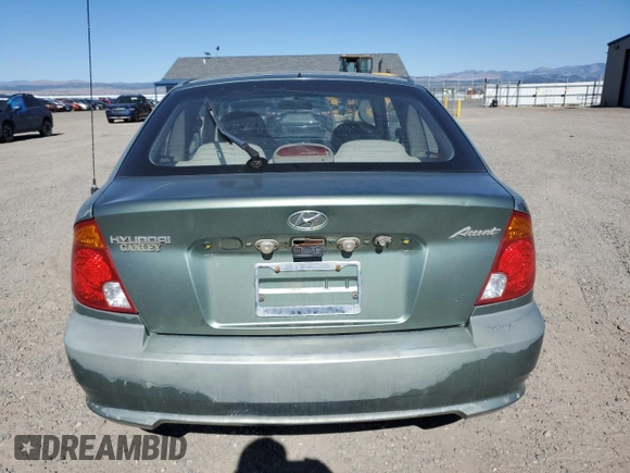 2003 Hyundai Accent GL with VIN KMHCG35C83U257641, listed as a Copart auction lot 73421464 with 143,814 mi miles and Clean Title. Bid and sale history available at carsss.com. Image 6.