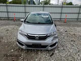 2019 Honda Fit LX z VIN 3HGGK5H47KM722595, wystawiony jako Copart lot #56819975 z przebiegiem 31 371 mil mil oraz Szkoda całkowita • Salvage title. Historia ofert i sprzedaży dostępna na DreamBid. Obrazek 13.