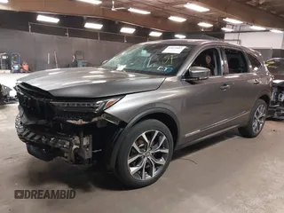 2022 Acura MDX Technology with VIN 5J8YE1H4XNL042636, listed as a IAAI auction lot 42019087 with 54,514 mi miles and . Bid and sale history available at DreamBid. Image 2.