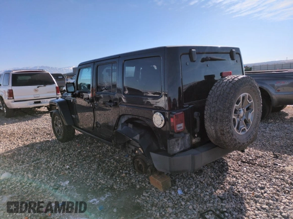 2013 Jeep Wrangler Unlimited Rubicon 10th Anniversary z VIN 1C4HJWFG6DL557085, wystawiony jako Copart lot #41693075 z przebiegiem 139 240 mil mil oraz Szkoda całkowita • Salvage title. Historia ofert i sprzedaży dostępna na DreamBid. Obrazek 2.