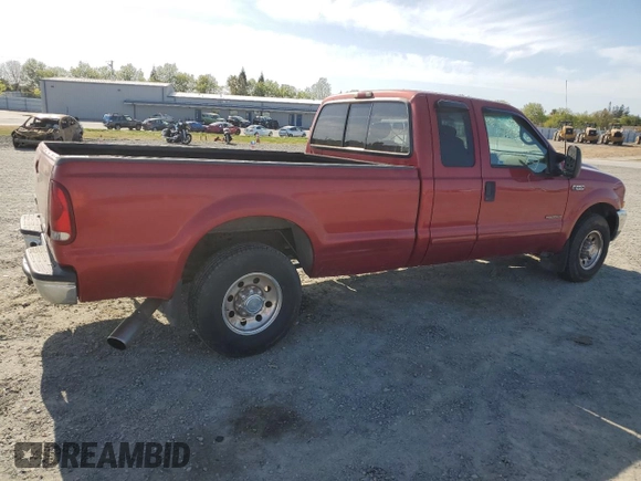 2002 Ford F-250 XL with VIN 1FTNX20F02EB64128, listed as a Copart auction lot 51979895 with 162,117 mi miles and Salvage title. Bid and sale history available at DreamBid. Image 3.
