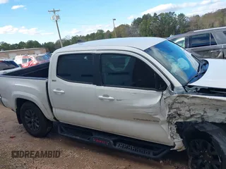 2023 Toyota Tacoma SR5 z VIN 3TYAZ5CN6PT039427, wystawiony jako IAAI lot #40866490 z przebiegiem 18 481 mil mil oraz . Historia ofert i sprzedaży dostępna na DreamBid. Obrazek 13.