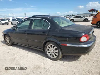 2003 Jaguar X-Type 2.5L Manual z VIN SAJEA51D73XD21289, wystawiony jako Copart lot #59583194 z przebiegiem 70 333 mil mil oraz Czysty tytuł • Clean title. Historia ofert i sprzedaży dostępna na DreamBid. Obrazek 2.