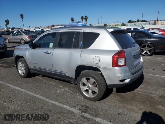2013 Jeep Compass Sport with VIN 1C4NJCBB9DD258230, listed as a Copart auction lot 84009494 with 195,750 mi miles and Salvage Title. Bid and sale history available at carsss.com. Image 2.