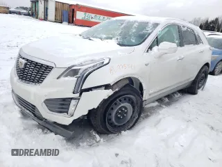 2022 Cadillac XT5 AWD Premium Luxury with VIN 1GYKNDRS5NZ133758, listed as a Copart auction lot 80975144 with 12,590 mi miles and Salvage title. Bid and sale history available at DreamBid. Image 1.