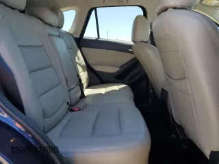 2014 Mazda CX-5 Touring with VIN JM3KE2CY7E0362879, listed as a Copart auction lot 53079545 with 70,863 mi miles and Salvage Title. Bid and sale history available at carsss.com. Image 11.