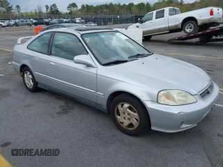2000 Honda Civic EX with VIN 1HGEJ8246YL011923, listed as a IAAI auction lot 41857839 with 215,334 mi miles. Bid and sale history available at carsss.com. Image 1.