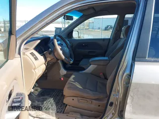 2007 Honda Pilot EX with VIN 2HKYF184X7H534943, listed as a IAAI auction lot 41818741 with 220,151 mi miles. Bid and sale history available at carsss.com. Image 5.