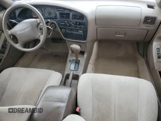 1995 Toyota Camry LE with VIN 4T1SK12E8SU548790, listed as a Copart auction lot 59390925 with 207,392 mi miles and Salvage title. Bid and sale history available at DreamBid. Image 8.