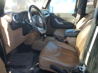 2014 Jeep Wrangler Unlimited Sahara with VIN 1C4BJWEG1EL109197, listed as a Copart auction lot 41699645 with 168,391 mi miles and Salvage Title. Bid and sale history available at carsss.com. Image 7.
