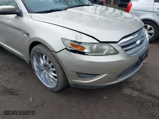 2011 Ford Taurus SEL with VIN 1FAHP2EW4BG147591, listed as a IAAI auction lot 41754058 with 167,271 mi miles. Bid and sale history available at carsss.com. Image 6.