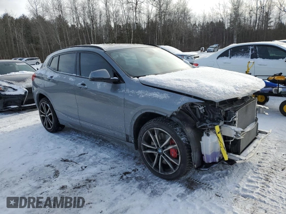2022 BMW X2 xDrive28i with VIN WBXYJ1C03N5U59814, listed as a Copart auction lot 86088784 with 60,787 mi miles and Salvage Title. Bid and sale history available at carsss.com. Image 4.