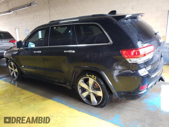 2015 Jeep Grand Cherokee Overland with VIN 1C4RJFCG8FC653117, listed as a Copart auction lot 49254595 with 142,359 mi miles and Clean Title. Bid and sale history available at carsss.com. Image 2.