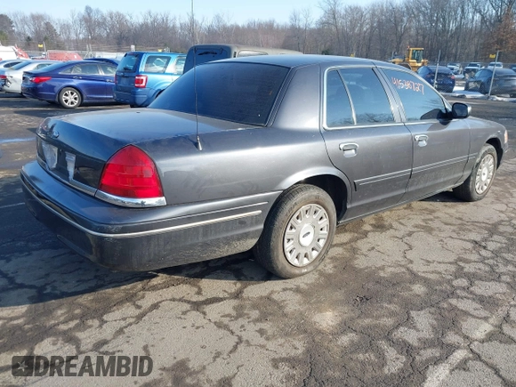 2005 Ford Police Interceptor z VIN 2FAHP71W95X170821, wystawiony jako IAAI lot #41538727 z przebiegiem 115 722 mil mil oraz . Historia ofert i sprzedaży dostępna na DreamBid. Obrazek 4.