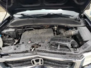 2012 Honda Ridgeline RT with VIN 5FPYK1F27CB454710, listed as a Copart auction lot 57634595 with 168,131 mi miles and Salvage title. Bid and sale history available at DreamBid. Image 11.