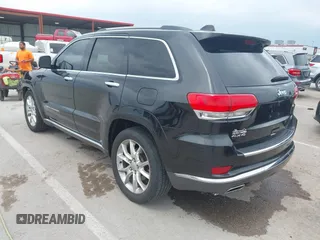 2015 Jeep Grand Cherokee Summit z VIN 1C4RJFJT0FC674494, wystawiony jako IAAI lot #42056835 z przebiegiem 143 969 mil mil oraz . Historia ofert i sprzedaży dostępna na DreamBid. Obrazek 3.