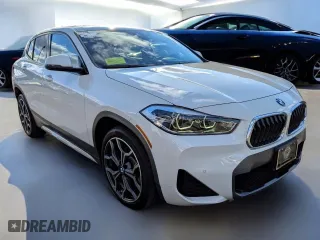2022 BMW X2 xDrive28i with VIN WBXYJ1C07N5U544XX, listed as a Copart auction lot 52847455 with 34,442 mi miles and Clean Title. Bid and sale history available at carsss.com. Image 1.