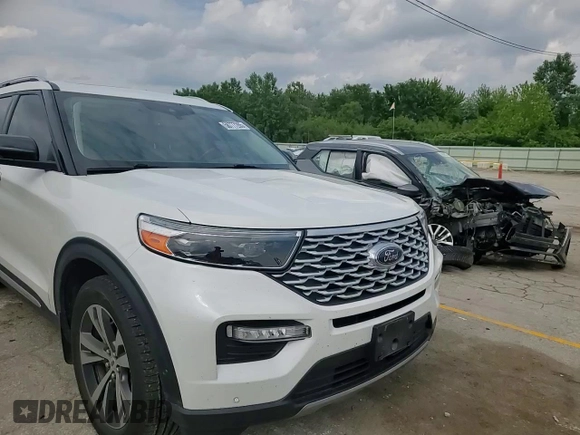 2020 Ford Explorer Platinum z VIN 1FM5K8HC4LGA06047, wystawiony jako Copart lot #58777285 z przebiegiem Nie podano mil oraz Szkoda całkowita • Salvage title. Historia ofert i sprzedaży dostępna na DreamBid. Obrazek 13.