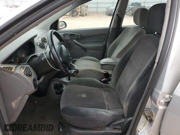 2004 Ford Focus with VIN 3FAFP37Z14R102723, listed as a Copart auction lot 44138195 with 220,354 mi miles and Salvage title. Bid and sale history available at DreamBid. Image 7.
