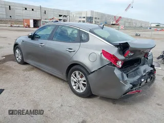 2016 Kia Optima LX with VIN 5XXGT4L37GG019897, listed as a IAAI auction lot 42582213 with 90,318 mi miles and . Bid and sale history available at DreamBid. Image 3.
