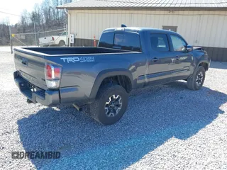 2023 Toyota Tacoma SR5 z VIN 3TMDZ5BN1PM163714, wystawiony jako IAAI lot #41814446 z przebiegiem 14 069 mil mil oraz . Historia ofert i sprzedaży dostępna na DreamBid. Obrazek 4.