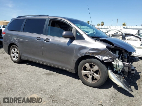 2014 Toyota Sienna LE AAS with VIN 5TDKK3DC0ES512211, listed as a Copart auction lot 49673535 with 164,465 mi miles and Salvage title. Bid and sale history available at DreamBid. Image 4.