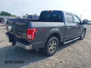 2015 Ford F-150 XLT with VIN 1FTEW1EG1FFB89473, listed as a IAAI auction lot 42590072 with 142,614 mi miles and . Bid and sale history available at DreamBid. Image 4.