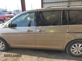 2010 Honda Odyssey EX-L with VIN 5FNRL3H79AB048049, listed as a IAAI auction lot 42055090 with 142,736 mi miles. Bid and sale history available at carsss.com. Image 14.