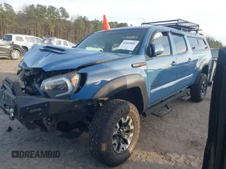 2015 Toyota Tacoma with VIN 3TMMU4FN7FM079866, listed as a IAAI auction lot 41618881 with 165,268 mi miles. Bid and sale history available at carsss.com. Image 2.