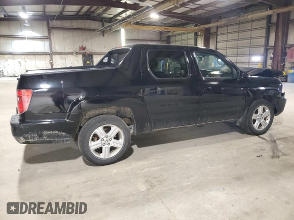 2010 Honda Ridgeline RTL with VIN 5FPYK1F5XAB011944, listed as a Copart auction lot 52434175 with 137,585 mi miles and Salvage title. Bid and sale history available at DreamBid. Image 3.