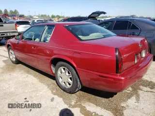 2000 Cadillac Eldorado Touring ETC z VIN 1G6ET129XYU191433, wystawiony jako Copart lot #58108224 z przebiegiem 76 957 mil mil oraz Szkody całkowita. Historia ofert i sprzedaży dostępna na DreamBid. Obrazek 2.