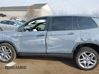 2024 Honda Passport EX-L with VIN 5FNYF8H54RB015972, listed as a IAAI auction lot 41904138 with 9,638 mi miles and . Bid and sale history available at DreamBid. Image 14.