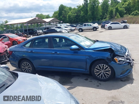 2021 Volkswagen Jetta S z VIN 3VWC57BU6MM046066, wystawiony jako IAAI lot #42199064 z przebiegiem 86 394 mil mil oraz . Historia ofert i sprzedaży dostępna na DreamBid. Obrazek 13.