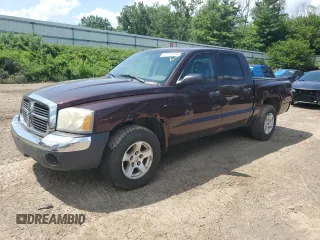 2005 Dodge Dakota SLT z VIN 1D7HW48K45S263060, wystawiony jako Copart lot #62115274 z przebiegiem 187 696 mil mil oraz Czysty tytuł • Clean title. Historia ofert i sprzedaży dostępna na DreamBid. Obrazek 1.