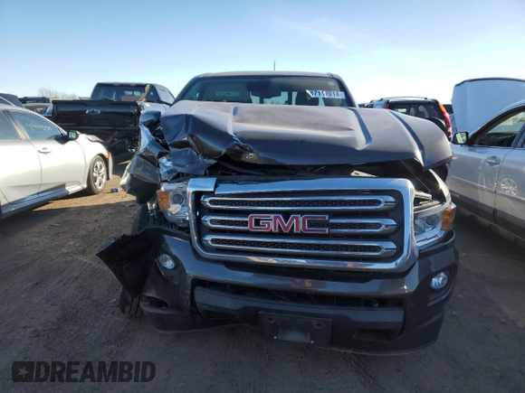 2019 GMC Canyon 4WD SLE with VIN 1GTG6CEN0K1266330, listed as a Copart auction lot 87117014 with 42,096 mi miles and Salvage Title. Bid and sale history available at carsss.com. Image 5.