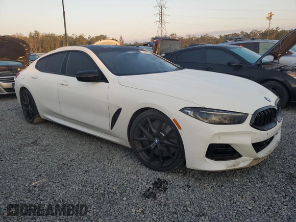 2023 BMW 8 Series M850i z VIN WBAGV8C0XPCL58173, wystawiony jako Copart lot #76322394 z przebiegiem 24 954 mil mil oraz Nie do naprawy • Non repairable. Historia ofert i sprzedaży dostępna na DreamBid. Obrazek 4.