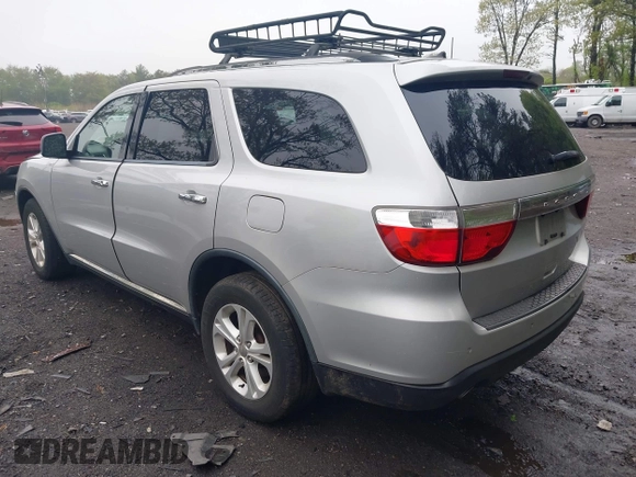2013 Dodge Durango Crew with VIN 1C4SDJDT8DC565608, listed as a IAAI auction lot 42181773 with 161,485 mi miles and . Bid and sale history available at DreamBid. Image 3.