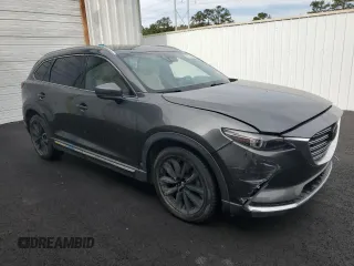 2016 Mazda CX-9 Grand Touring with VIN JM3TCADY5G0105533, listed as a Copart auction lot 43045945 with 91,881 mi miles and Clean Title. Bid and sale history available at DreamBid. Image 4.
