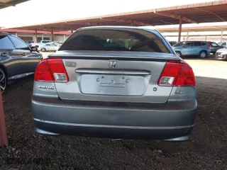 2005 Honda Civic Sdn VP with VIN 1HGES16315L005111, listed as a IAAI auction lot 42000293 with 110,373 mi miles. Bid and sale history available at carsss.com. Image 17.